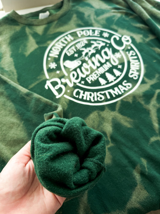 North Pole Brewing Co. Christmas Spirit Green Reverse Dye Sweatshirt